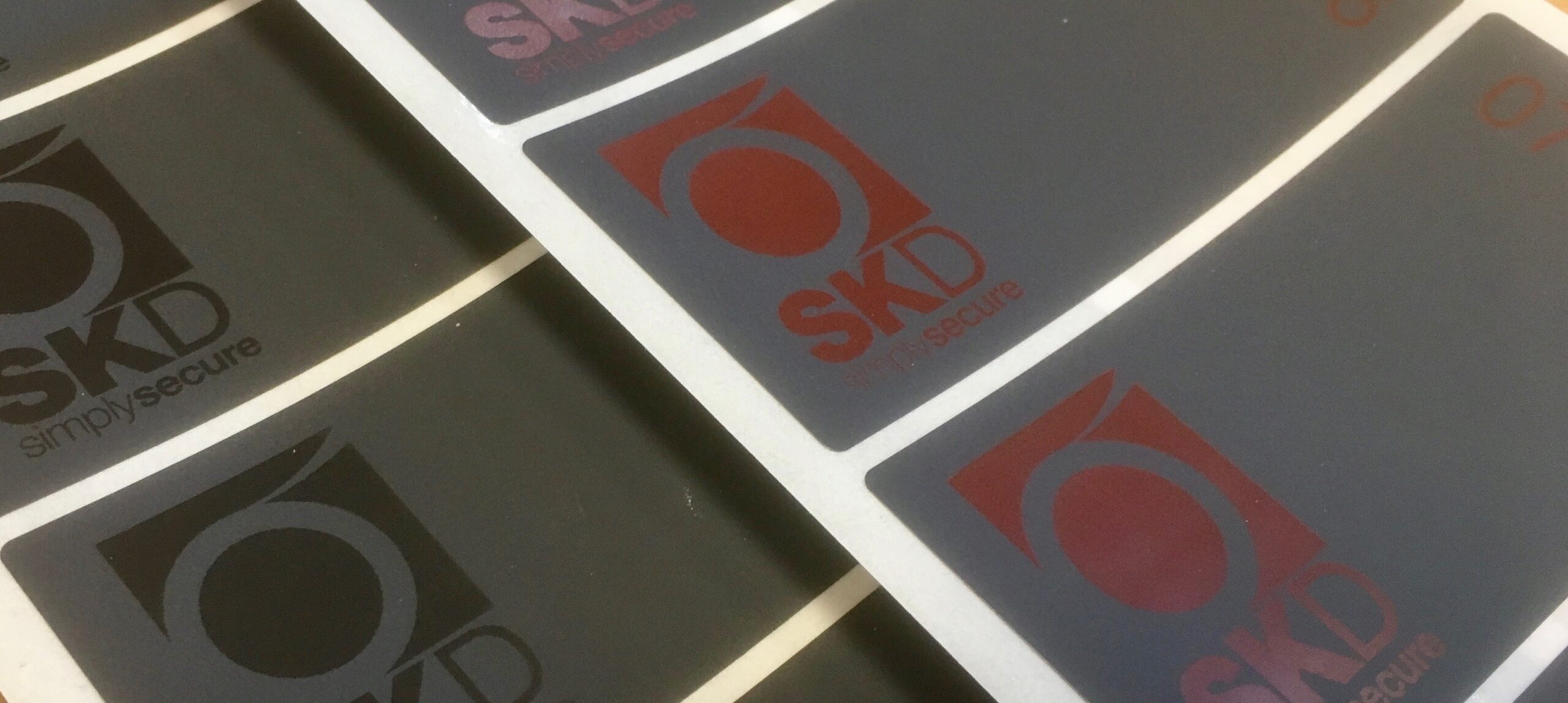 Security labels printed black and red